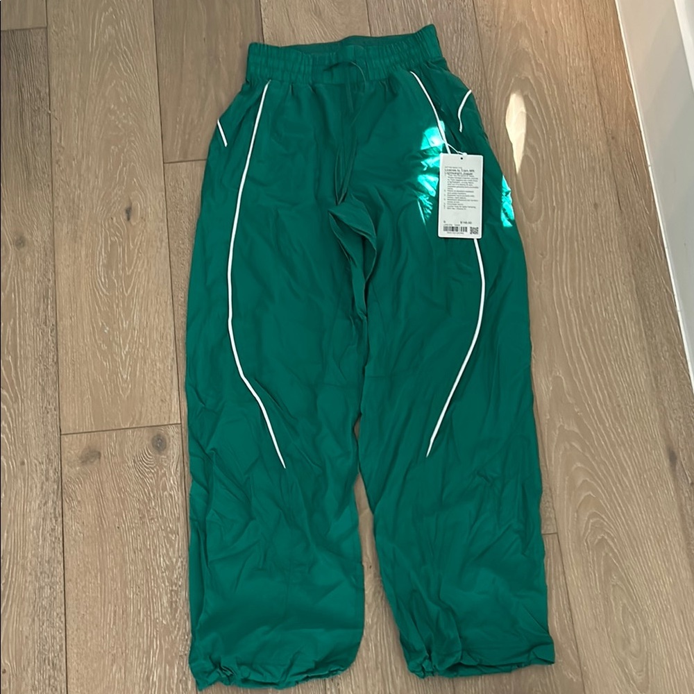 Green Track Pants with White Accents